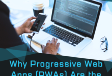 "A person working on a laptop displaying code while holding a smartphone, illustrating the concept of Progressive Web Apps (PWAs) with app-like functionality and cross-platform compatibility."